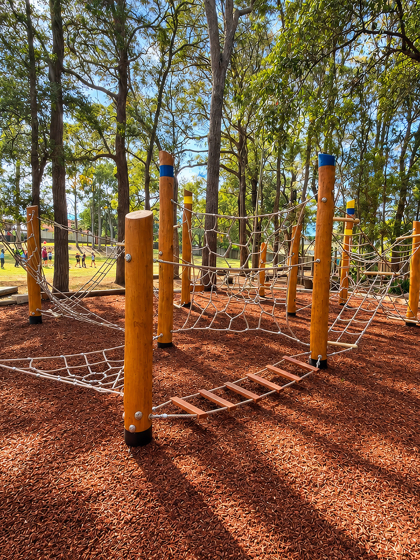 Nature-Inspired School Playground with Timber and Rope Climbing Structures